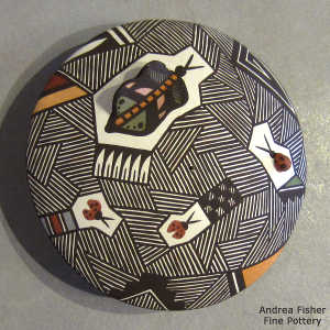 Butterfly, lady bug and fine line rain design on a polychrome seed pot