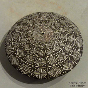 Fine line and geometric design on a black and white seedpot