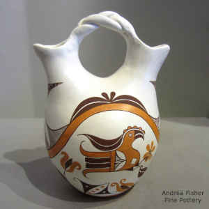 Parrot, flower, rainbow and geometric design on a polychrome wedding vase