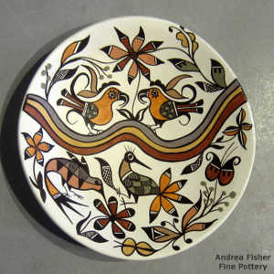 Bird, floral and rainbow design on a polychrome plate