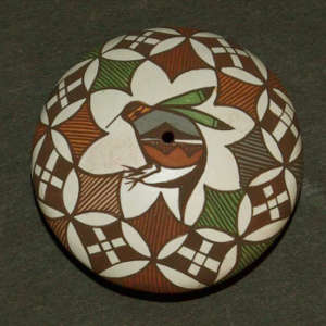 Fine line, bird and geometric designs on a polychrome seedpot
