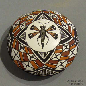 Dragonfly and geometric design on a polychrome seedpot