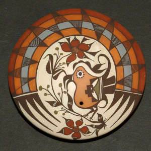 Parrot, flower and geometric design on a polychrome seedpot