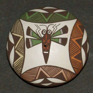Dragonfly and geometric design on a polychrome seedpot