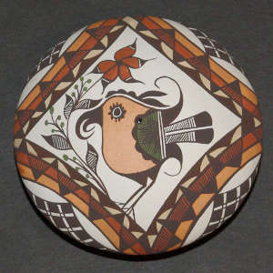 Parrot, flower and geometric design on a polychrome seedpot