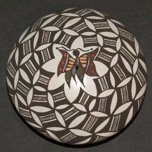 Fine line, butterfly and geometric design on a polychrome seed pot