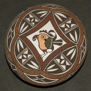 Butterfly and geometric design on a polychrome seedpot