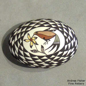 Hummingbird, flower and geometric design on a polychrome oval seed pot