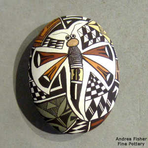 Shard, dragonfly and geometric design on a polychrome oval seed pot