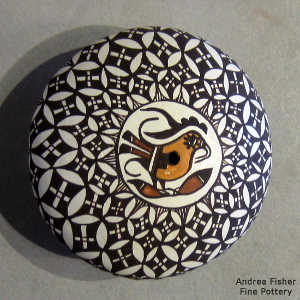 Parrot and geometric design on a polychrome seed pot