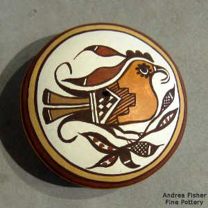 Parrot and geometric design on a polychrome seed pot