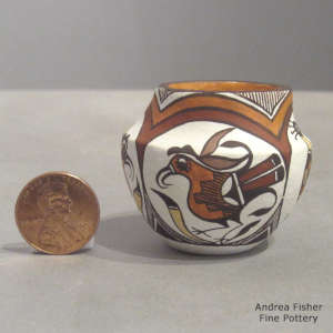 Bird and geometric design on a miniature polychrome jar