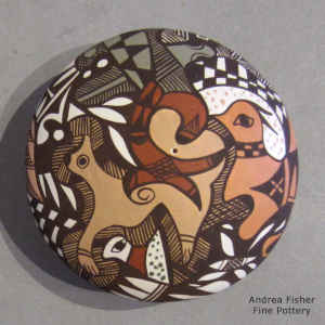 Fine line, bird element and geometric design on a polychrome seed pot
