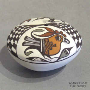 Birds and geometric design on a polychrome seed pot