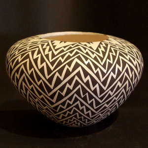 Lightining bolt and geometric design on a black and white jar