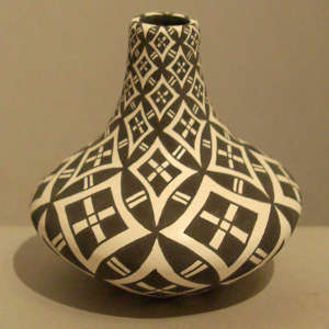 Geometric design on a black and white jar