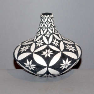 Geometric design on a long neck black and white jar