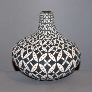 Geometric design on a polychrome tall neck jar