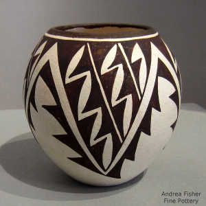 Geometric design on a black and white jar