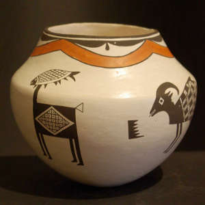 Mimbres animal designs on a polychrome jar