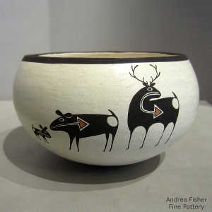 Animal and heart line design on a polychrome bowl