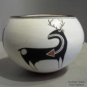 Deer and heart line design on a polychrome jar
