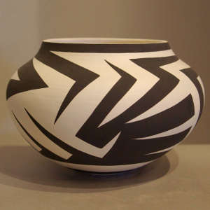 Geometric design on a black and white jar