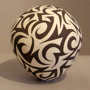 Tattoo design on a black and white seed pot