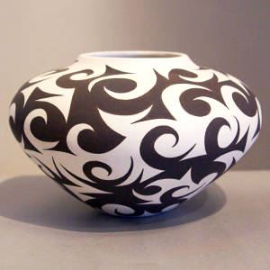 Tattoo design on a black and white jar