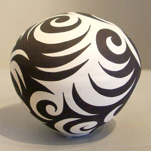 Tattoo design on a black and white seed pot