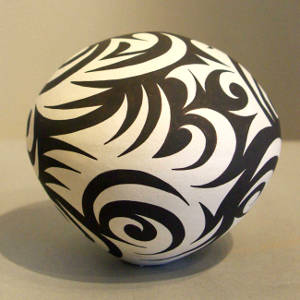 Tattoo design on a black and white seed pot