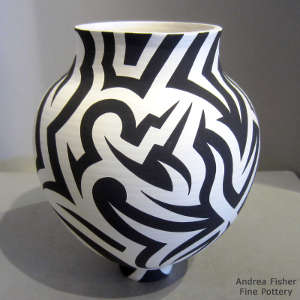 Tattoo geometric design on a black and white jar