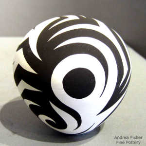 Tattoo design on a black and white seed pot