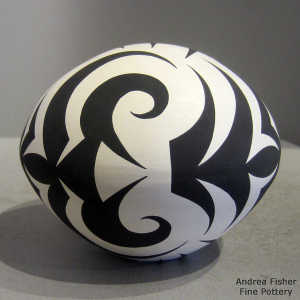 Black and white seed pot with a tattoo design