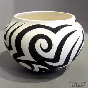 Tattoo geometric design on a black and white jar