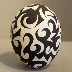 Tattoo geometric design on a black and white seedpot