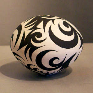 A geometric tattoo design on a black and white seedpot