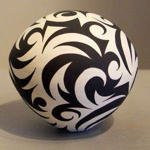 Geometric design decorating a black and white seedpot