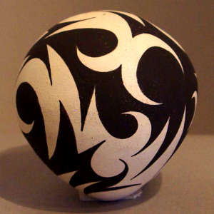 Tattoo design on a black and white seed pot