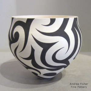 Tattoo geometric design on a black and white jar