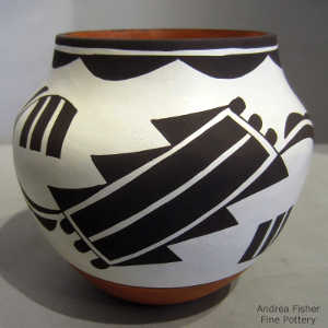 Bird element and geometric design on a polychrome jar