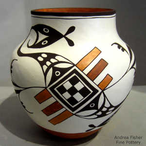 Bird element and geometric design on a polychrome jar