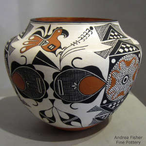 Parrot and geometric design on a polychrome jar