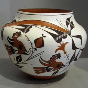 Bird, floral and geometric designs on a polychrome jar