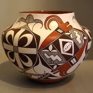 Bird element, medallion and geometric design on a polychrome jar