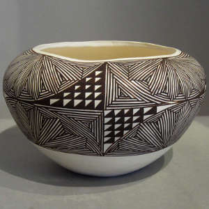 Geometric design on a black and white jar