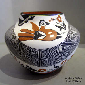 Fine line snowflake, parrot, rainbow and geometric design on a polychrome jar