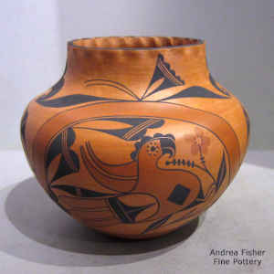 Parrot, rainbow and geometric design on a polychrome jar