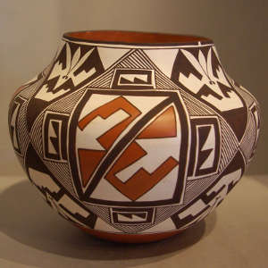 Medallion and geometric design on a polychrome jar
