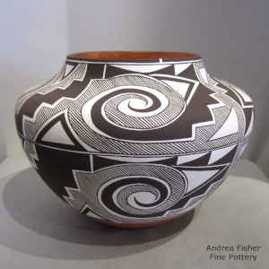 Tularosa spiral, rain, kiva step and geometric design on a polychrome jar